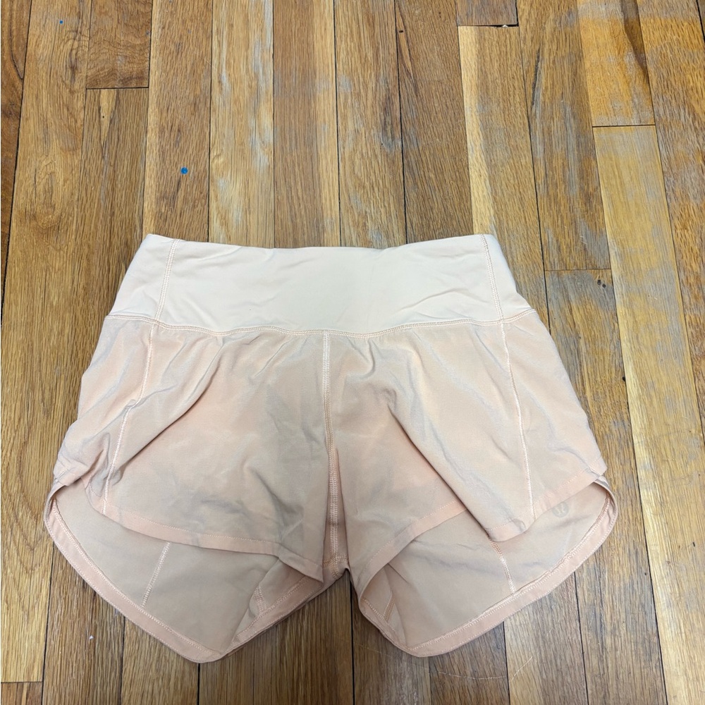 Lululemon peach colored speed up shorts